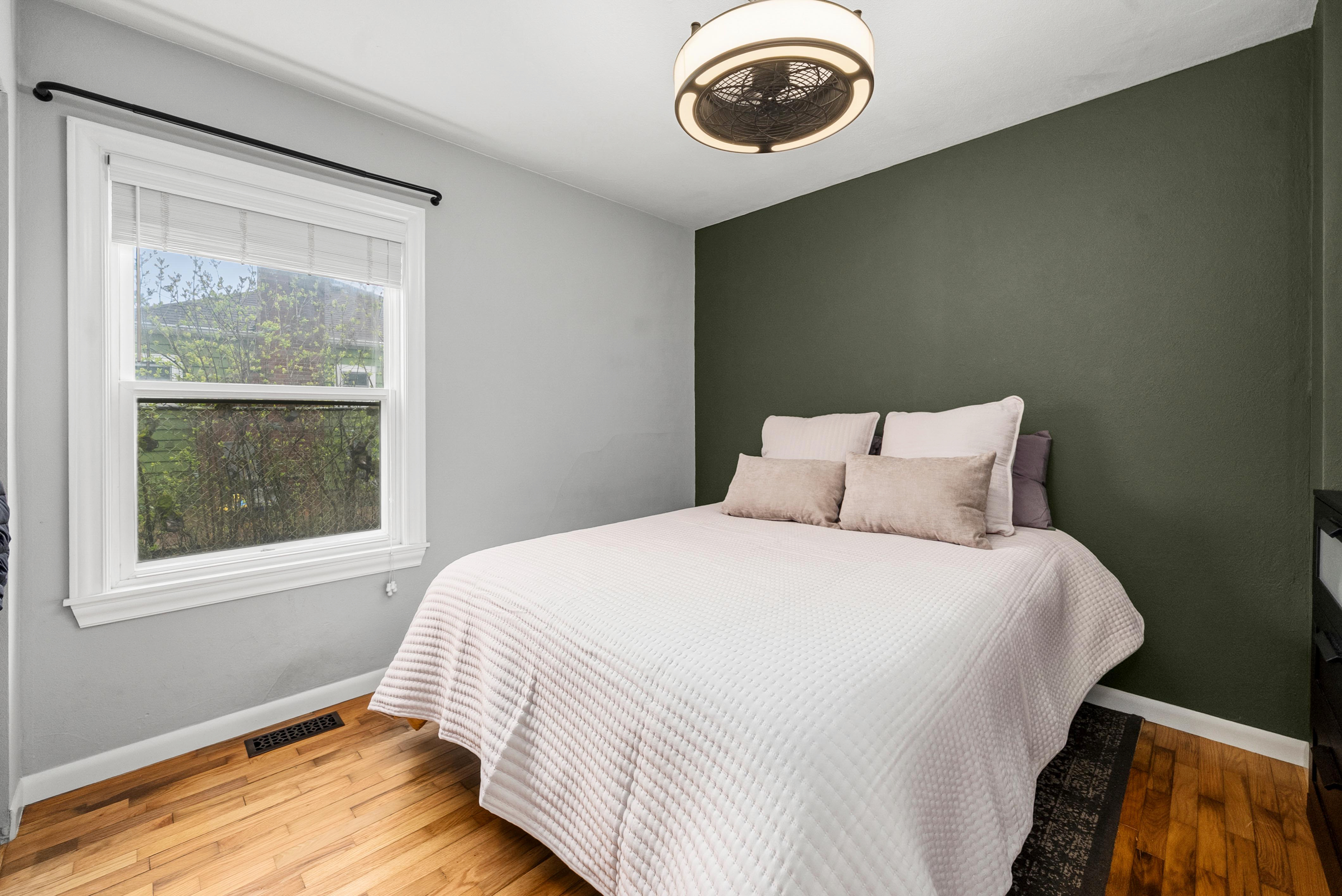 Second bedroom, green accent wall