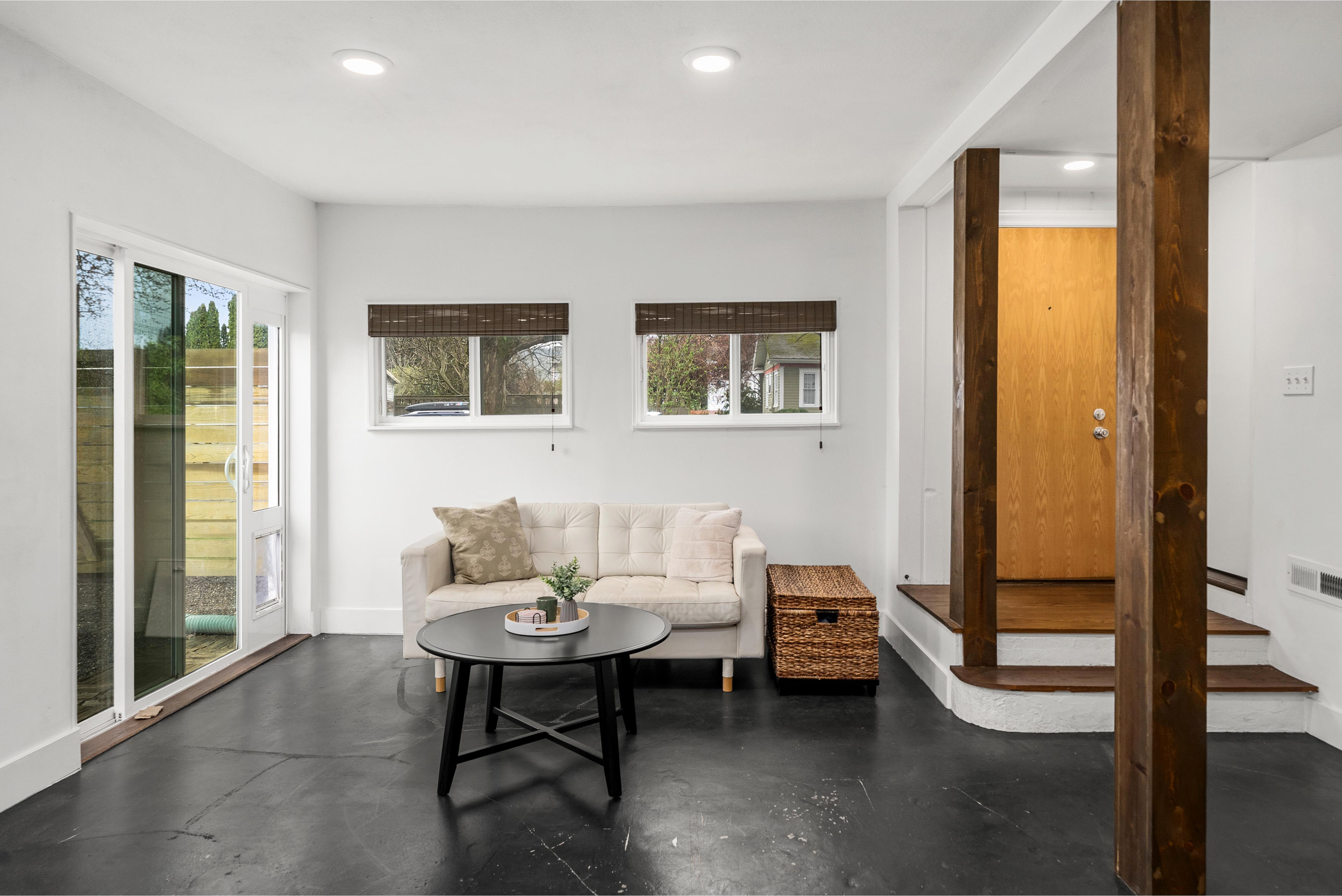 Den with sliding doors to yard