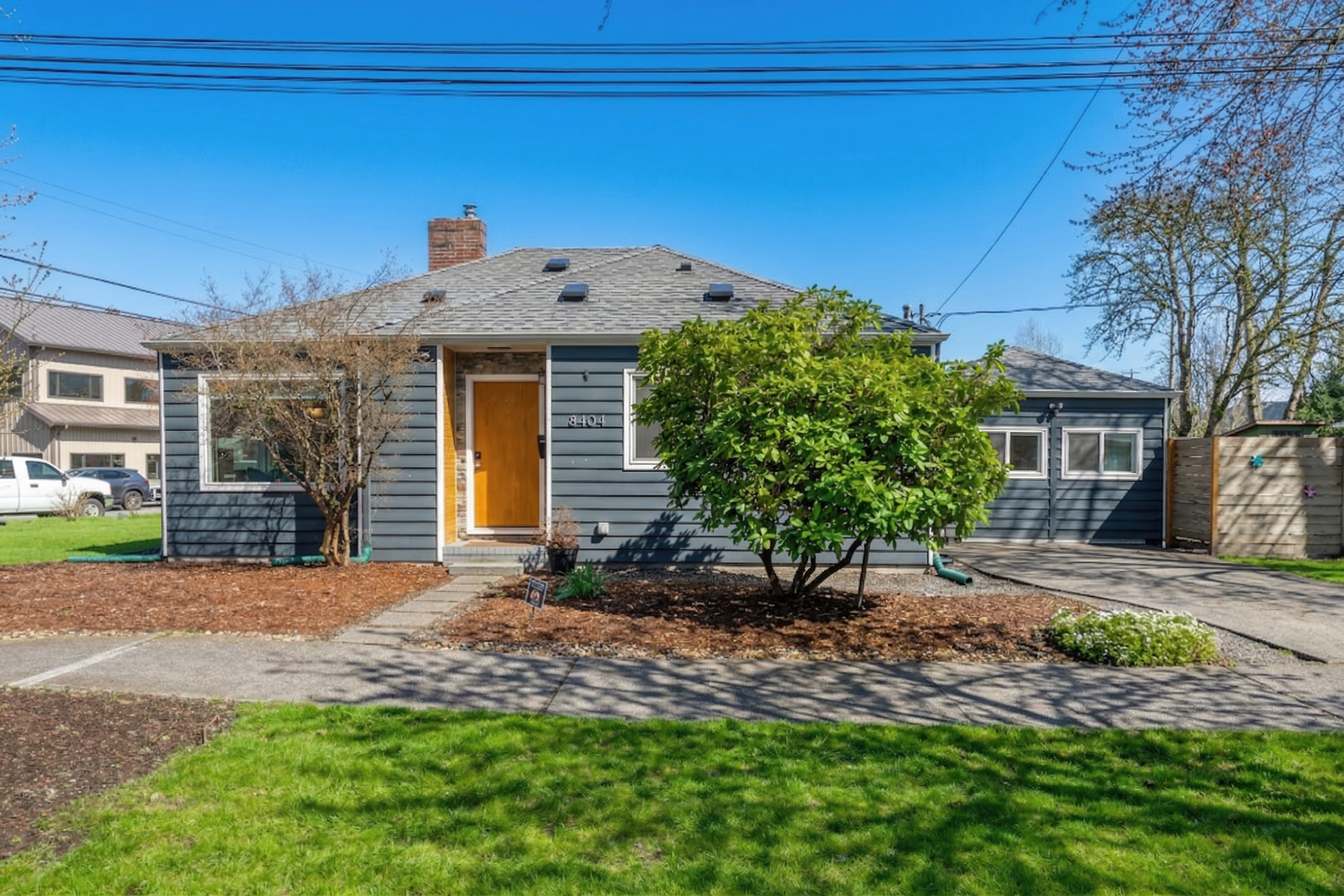 Front of home, sunny day